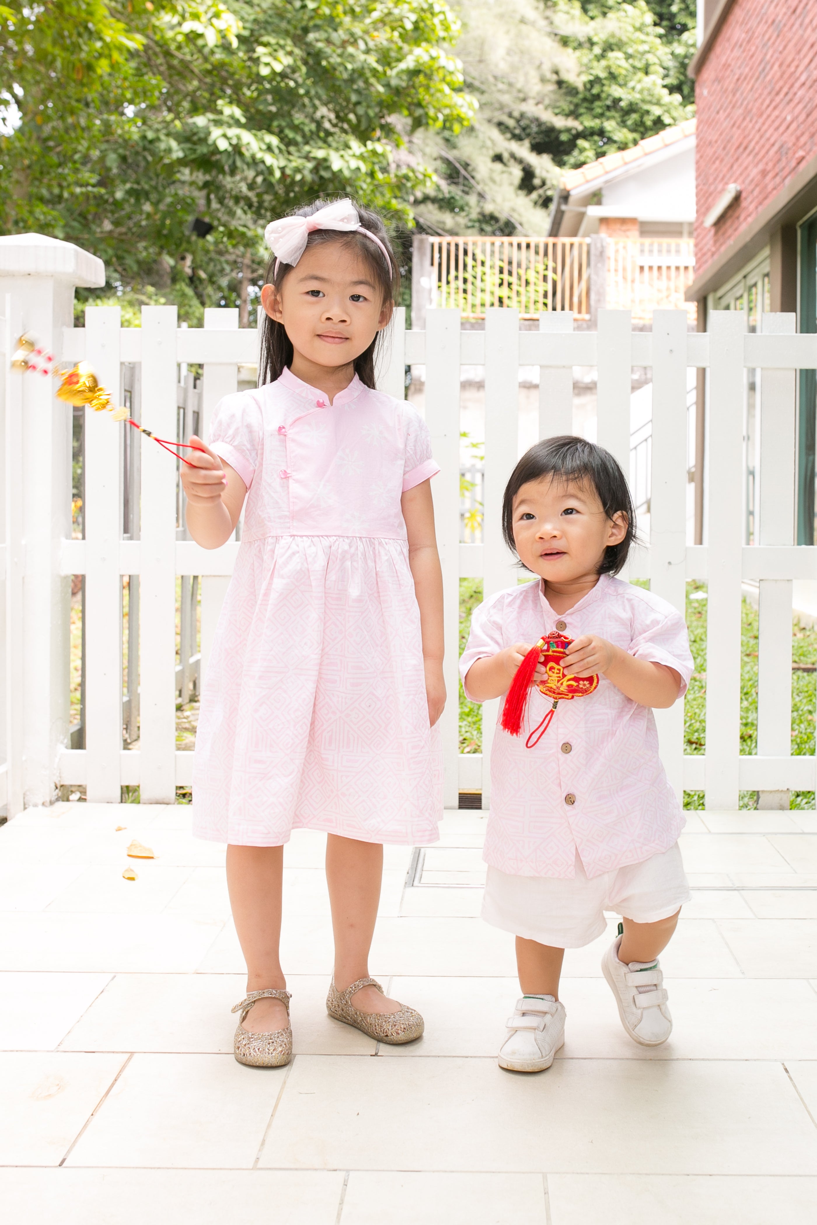 Chinese new year modern batik cheongsam kids dress (Pink Geometry)